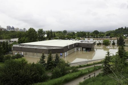 Flooding in Calgary, Alberta, displaced over ten thousand people from their homes. Experts expect extreme weather events to increase in frequency and magnitude. Image by Sean Esopenko, CC2.0.
