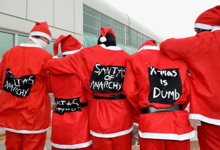The Santas of Anarchy delivered a holiday message to stop a massive coal port expansion in Vancouver. Photo by murray bush - flux photo