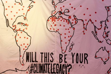 A display of a map of the world representing areas most impacted by climate change. Photo: Crystel Hajjar