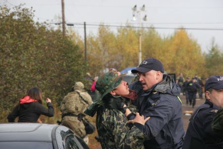 When cops attack. On October 17th, RCMP from Nova Scotia, PEI, New Brunswick and Quebec descended upon an anti-shale gas encampment with their guns drawn. [Photo: Miles Howe]