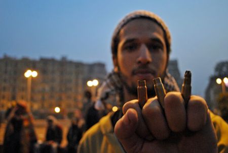 In 2011, a protestor showed bullet casings recovered from the ground following the army's attack on Tahrir Square. Photo by Ali Mustafa, CC license 4.0 BY-ND-NC.  See more of Ali's work at alimustafa84.wordpress.com 